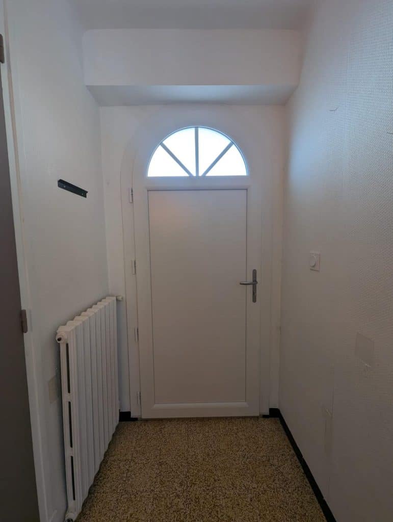 Porte d'entrée blanche ZILTEN tracy 1 - cintrée vue intérieur